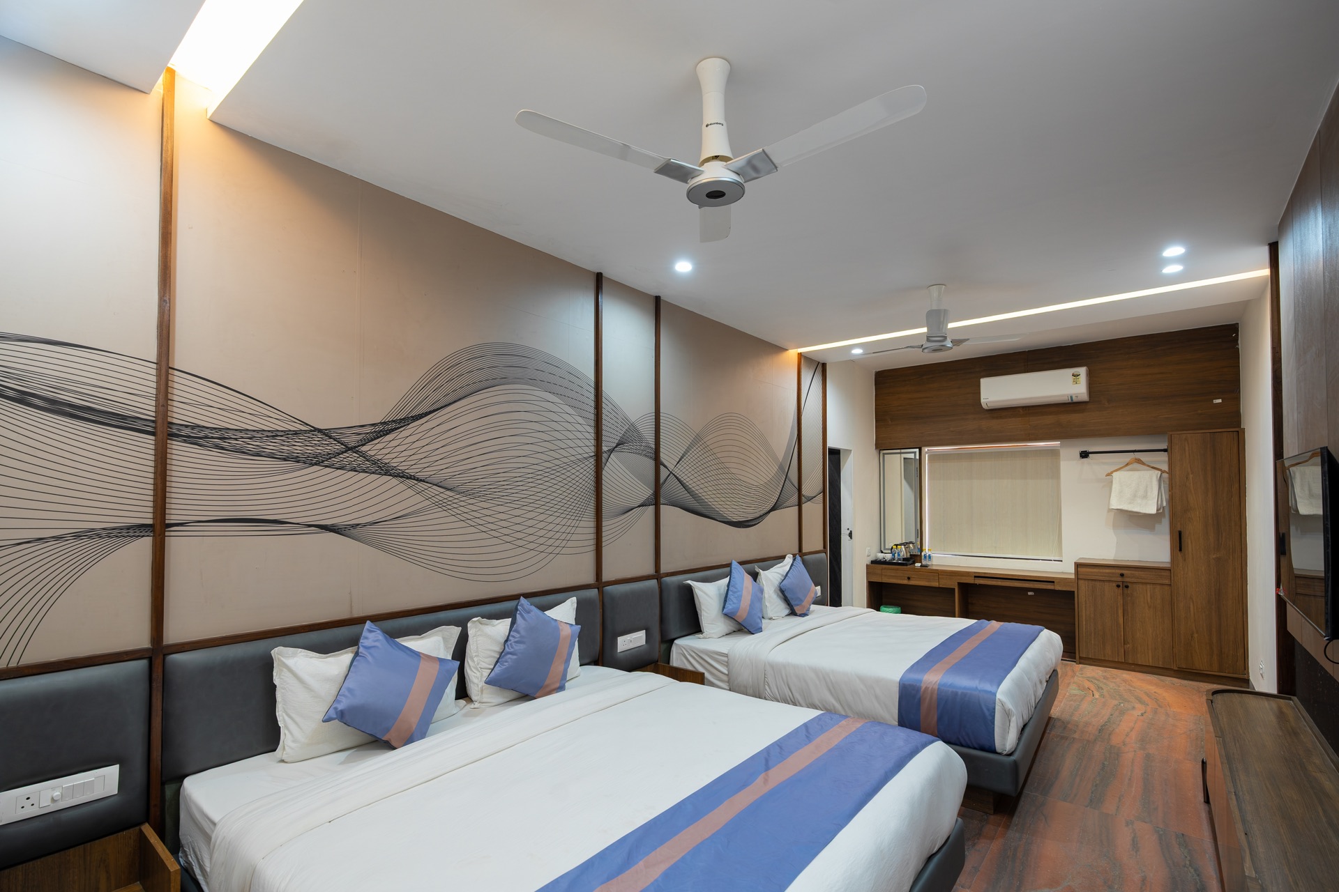 Family Room at Hotel Ramdev — two double beds with a private balcony